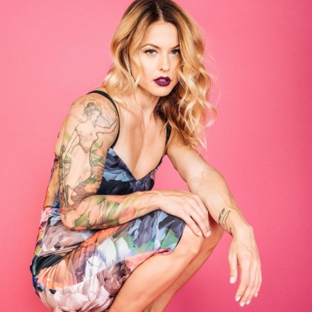 Christmas Abbott looks stunning in her goddess and other tattoos.